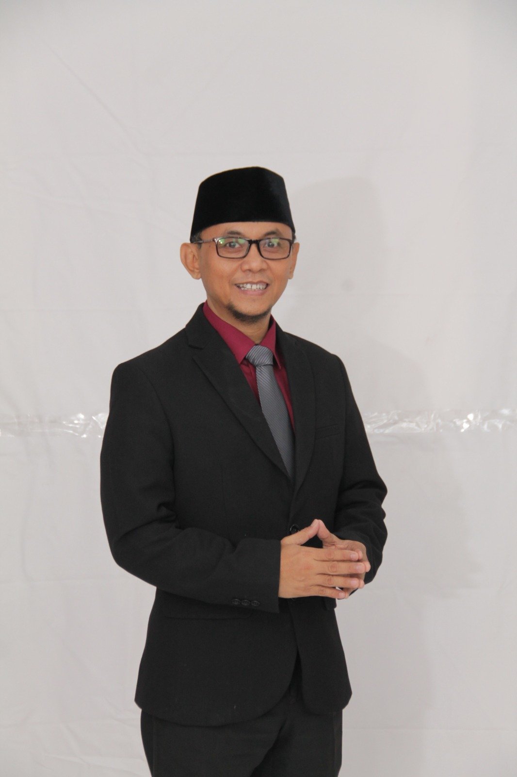 Dr. H. Naufal Ramadian, M.Si.
