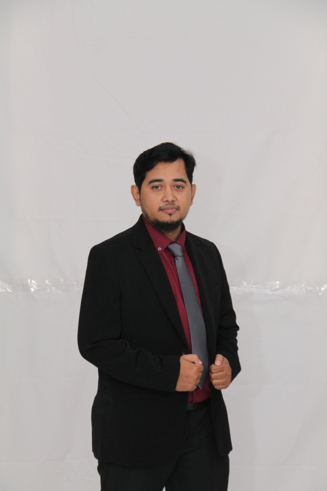 Andri, S.E., M.M